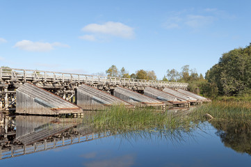 Fototapeta na wymiar Old wooden bridge with cutwater