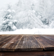 rustic table against winter landscape
