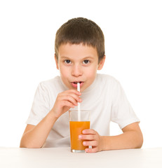 boy drink orange juice with a straw