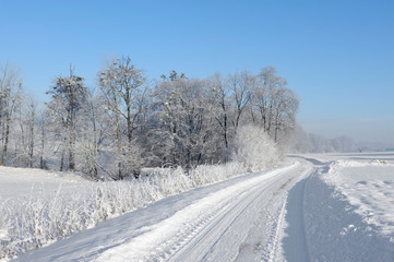 Fototapeta na wymiar Winter country road