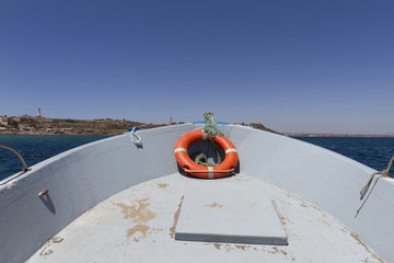 boat with orange lifesaver