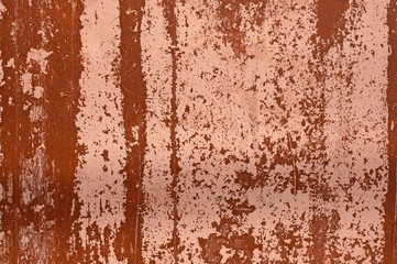 Old Plastered pink and brown wall as an abstract background