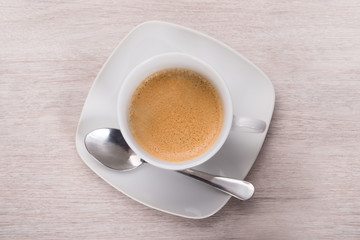 Cup of coffee on table