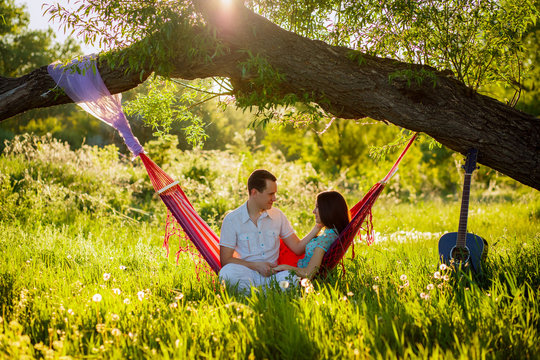 young couple relaxing in nature
