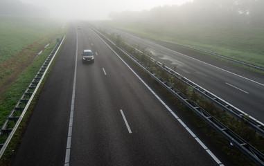 Dutch highway on a misty morning