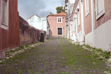 The old narrow street with old house