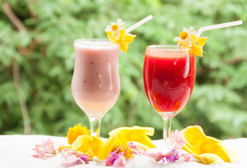 Strawberry yogurt and red cherry juice