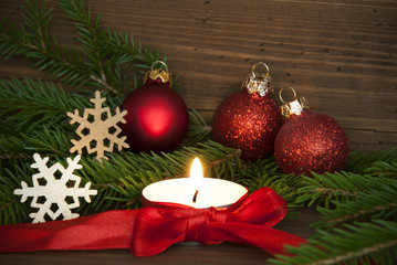 Winter or Christmas Background in Red Colors with Candle