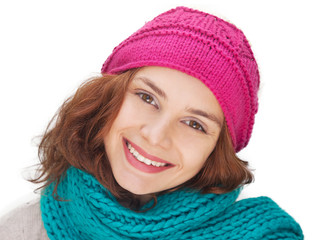 Portrait of woman on white background with woolen accessories