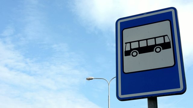 bus stop - sign&symbol - lamp - blue sky