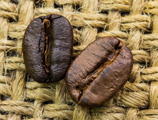 Coffee beans on sacking background