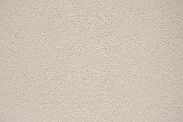 Beige plaster wall texture background