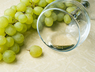grapes and overturned glass