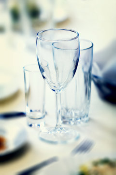 Glasses for drinks and cocktails at the festive table