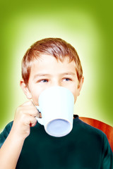 kid drinking from a cup