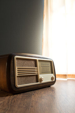 Vintage radio next to the window