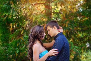 Fototapeta premium Young couple of lovers have fun in the park