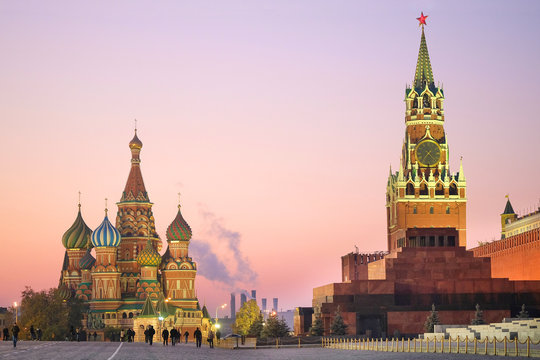 Cityscape with the image of night St. Basil Cathedral in Moscow