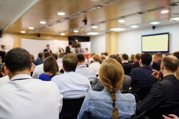 Fototapeta premium The audience listens to the acting in a conference hall