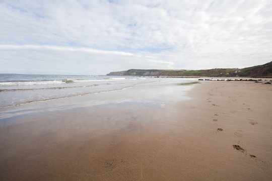 Footprints in the sand coastal image