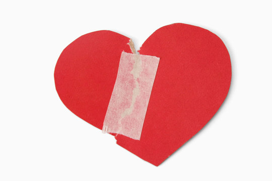 Red heart with adhesive plaster