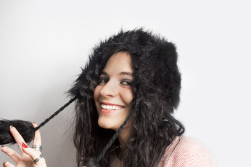 Obraz premium Fashion Girl with fur hat