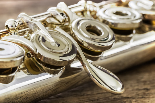 Modern Concert Flute on a Wood Table