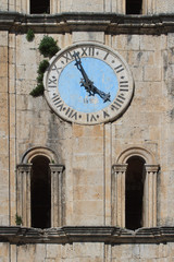 Fototapeta na wymiar Ancient clock tower of St Nicholas Church, Montenegro