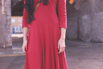 Young woman standing in the street