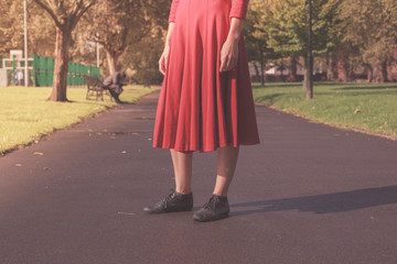 Young woman walking in the park