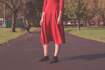 Young woman walking in the park