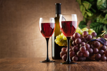 Glasses of red wine and bottle