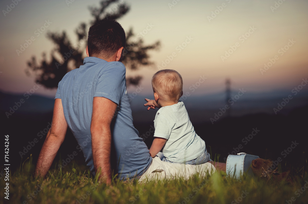 Wall mural father with son in nature