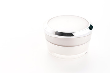 Cosmetic cream bottle isolated on white background