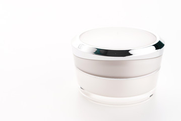 Cosmetic cream bottle isolated on white background