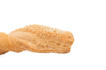 Cheese stick cracker with sesame seeds.