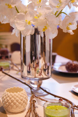 Scene of the table decorated with flowers