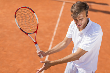 Young man playing tennis