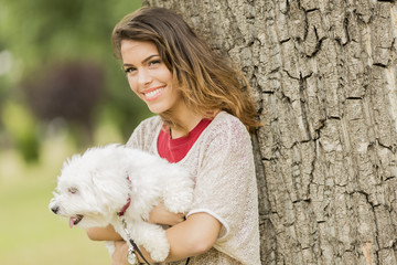 Young woman with a dog
