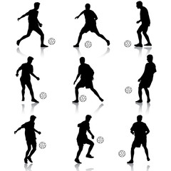 silhouettes of soccer players with the ball. Vector illustration