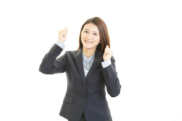 ガッツポーズの女性