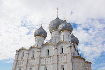 Fototapeta na wymiar Assumption Cathedral domes in Rostov against the sky