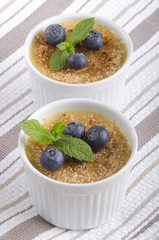 creme brulee with blueberries and mint