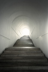 Light of the end of tunnel with stairs