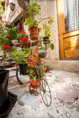 Fototapeta na wymiar decorative stand for flower pots on street