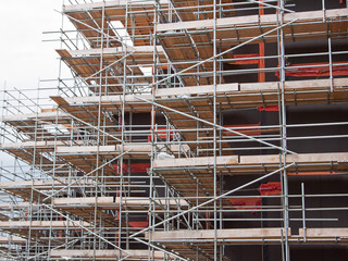 Scaffolded building in a UK construction project