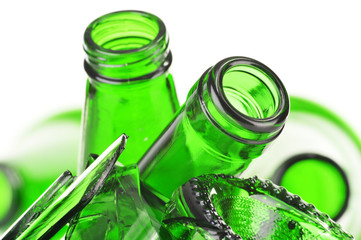 Pieces of broken glass over white background. Recycling