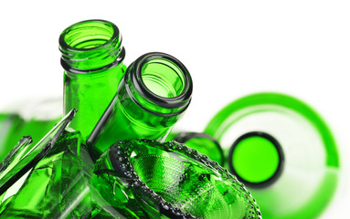 Pieces of broken glass over white background. Recycling