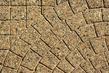 Paving stones that are laid in a nice pattern.