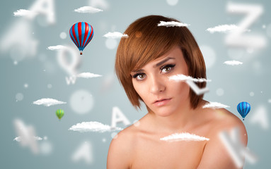 Beautiful young woman with wellness and healthcare clouds